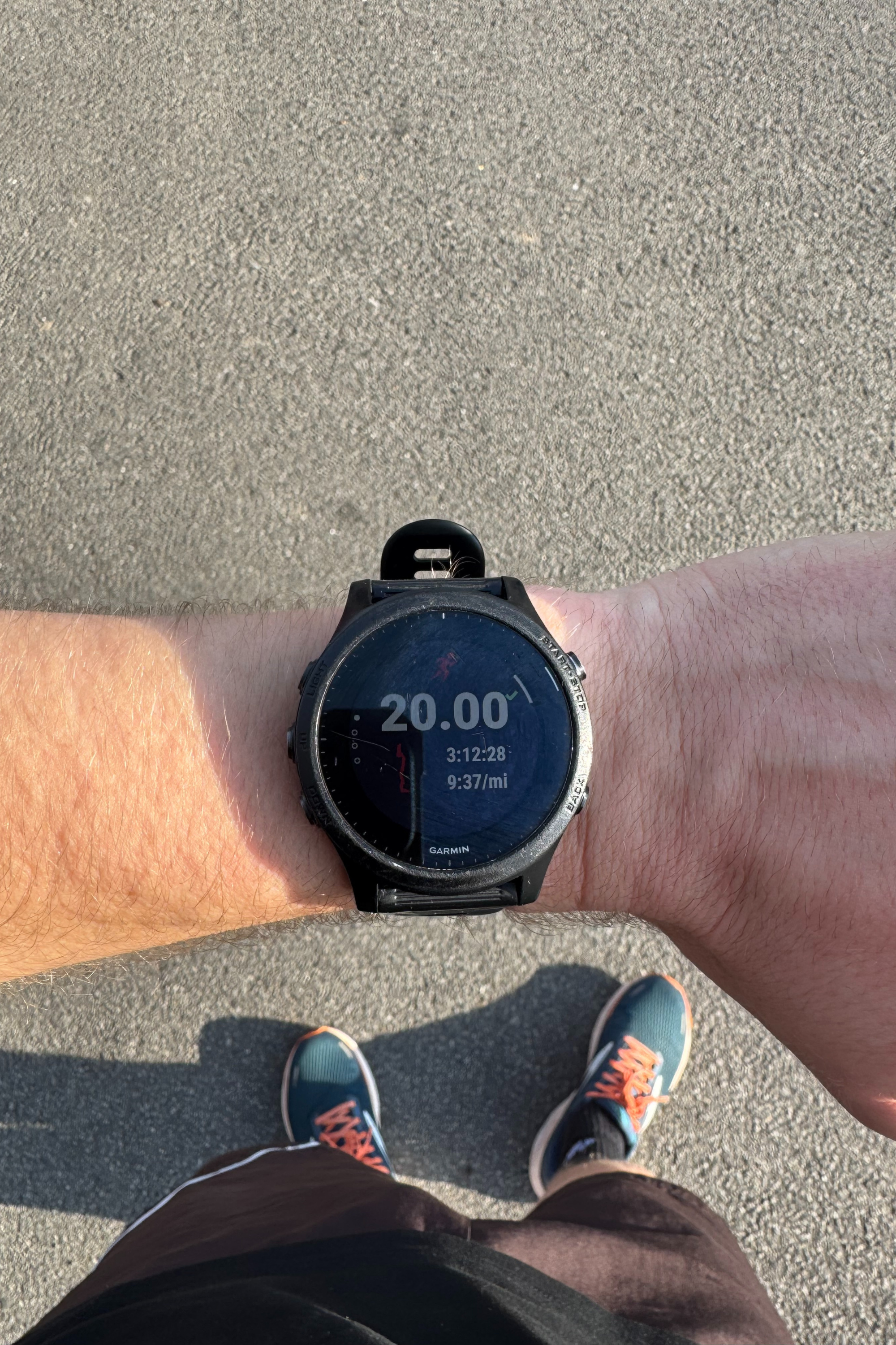A photo of Aaron's running clock with the time of 3 hours and 12 minutes recorded.