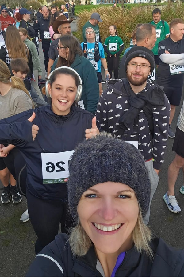 Kate, Hollie and Roy participating in the 2025 Plymouth Argyle Green Army Fun Run