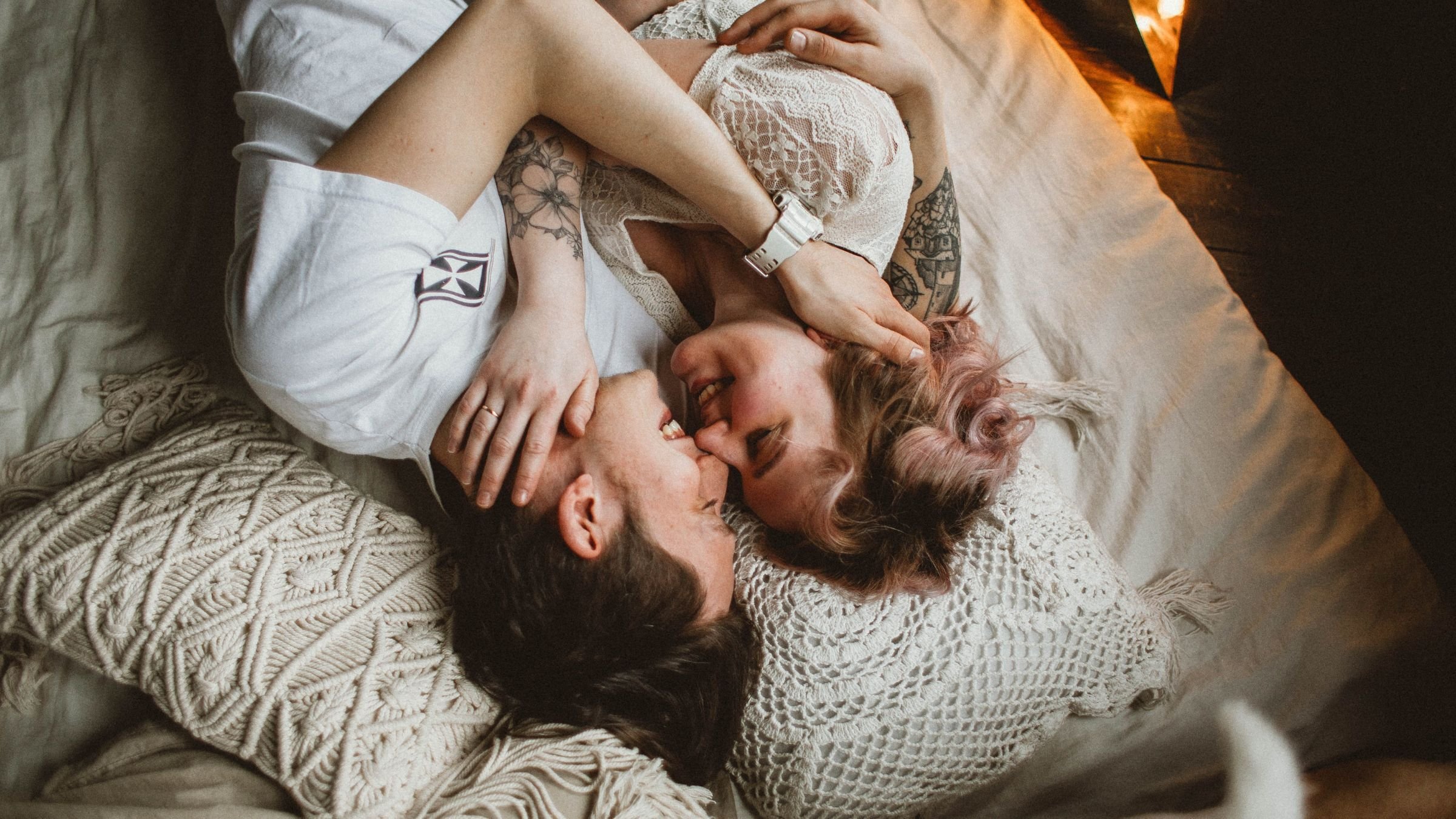 A happy couple hugging.