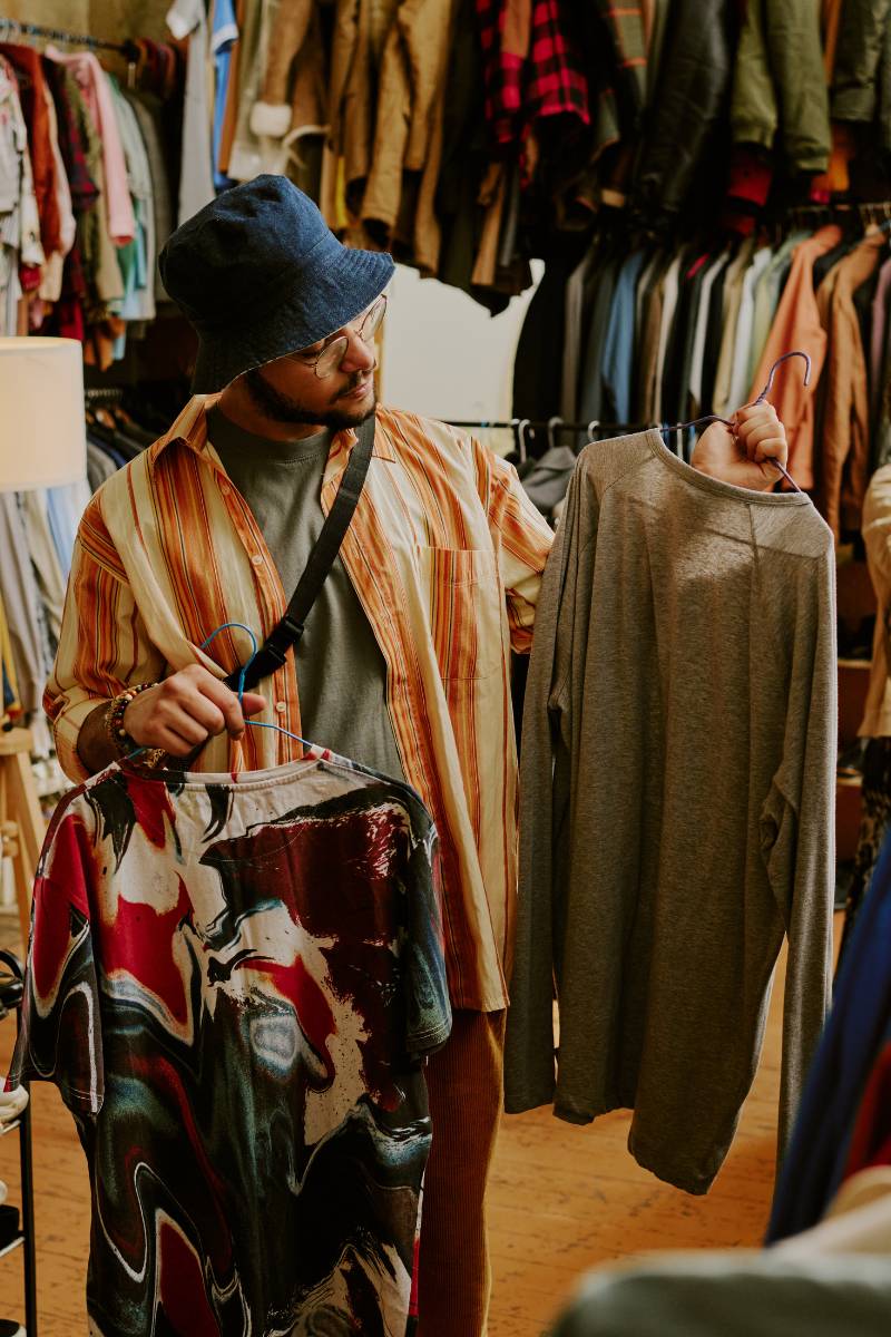 someone enjoying the current shopping trend of thrifting
