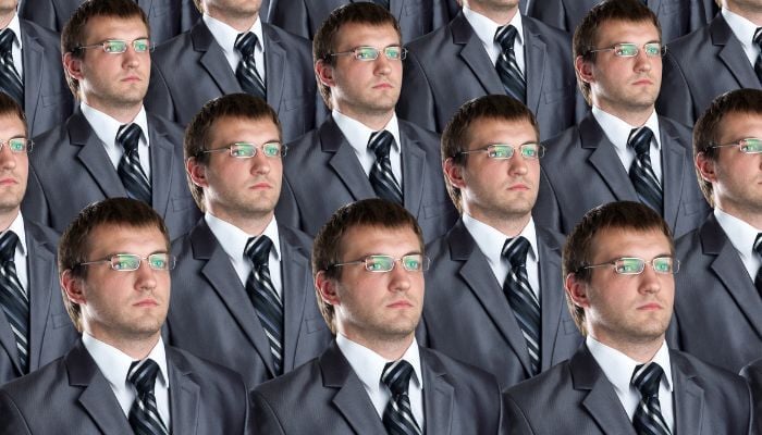 The same man wearing a suit and glasses has been copy and pasted several times. 