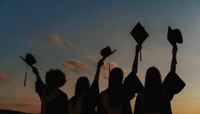 Graduates celebrating their graduation.