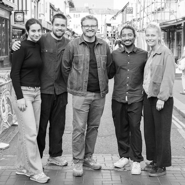 A slideshow of photos of the Gomi team.