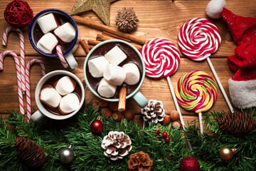 top-view-hot-chocolate-with-sweets_23-2148318745