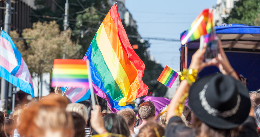 People marching for LGBTQIA+ Pride.